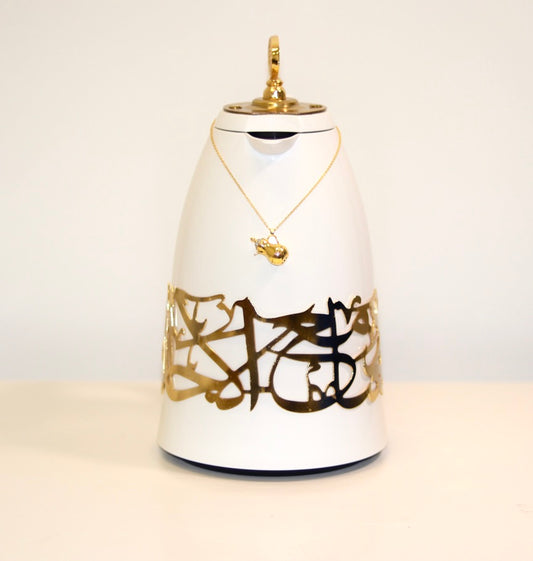 Elevate your coffee ritual with the Arabesque Elegance Charm set, designed to add opulent tradition to your hosting. Crafted from high-quality metal, featuring delicate Arabic calligraphy, it's perfect for labeling flasks with cultural beauty and luxury. A versatile addition for both special occasions and everyday use, ideal for coffee enthusiasts who appreciate heritage-inspired decor.