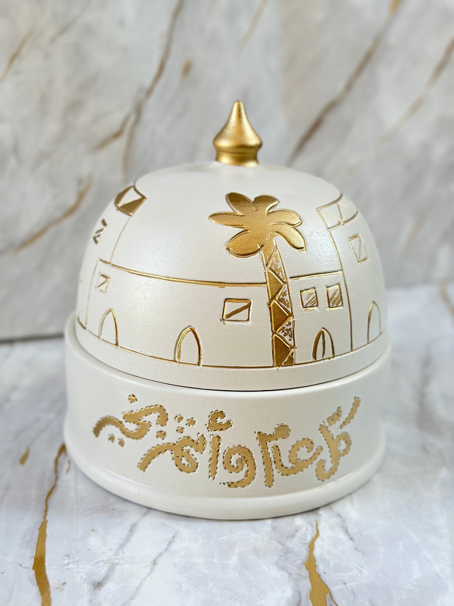 Impress your guests with our Handmade Ceramic Eid Chocolate Bowl, beautifully crafted with traditional gold calligraphy and intricate patterns. Whether used for serving chocolates or as a statement decor piece, it embodies the spirit of Eid with grace and elegance.