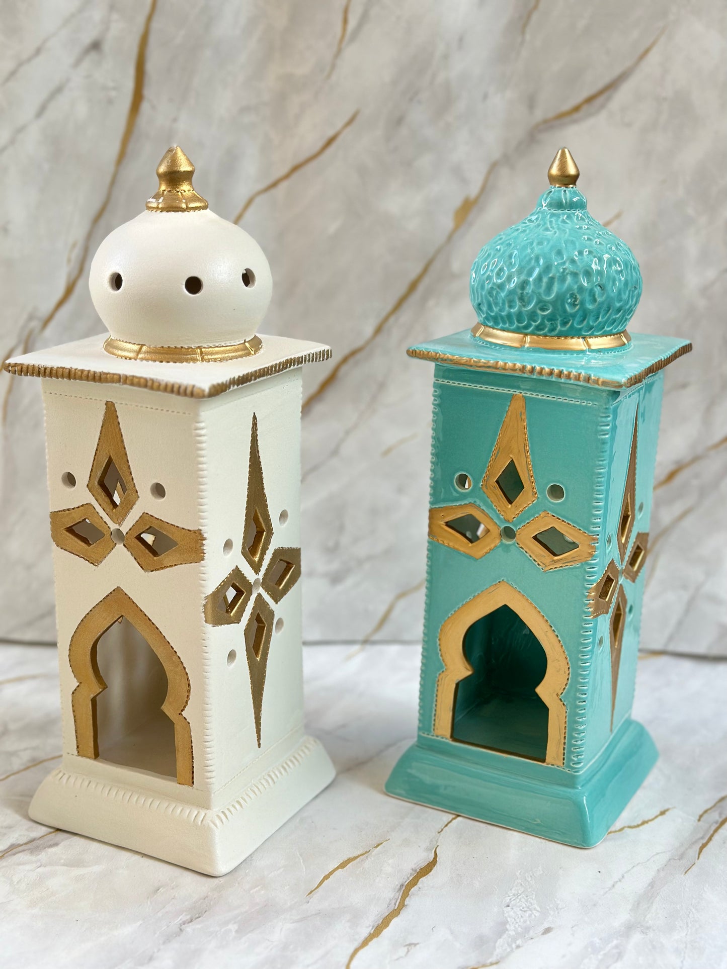 Welcome Ramadan with our Ceramic Minaret, meticulously crafted in cream and turquoise hues with luxurious golden embellishments. Its elegant design doubles as an electric candle holder, enhancing your spiritual environment effortlessly.