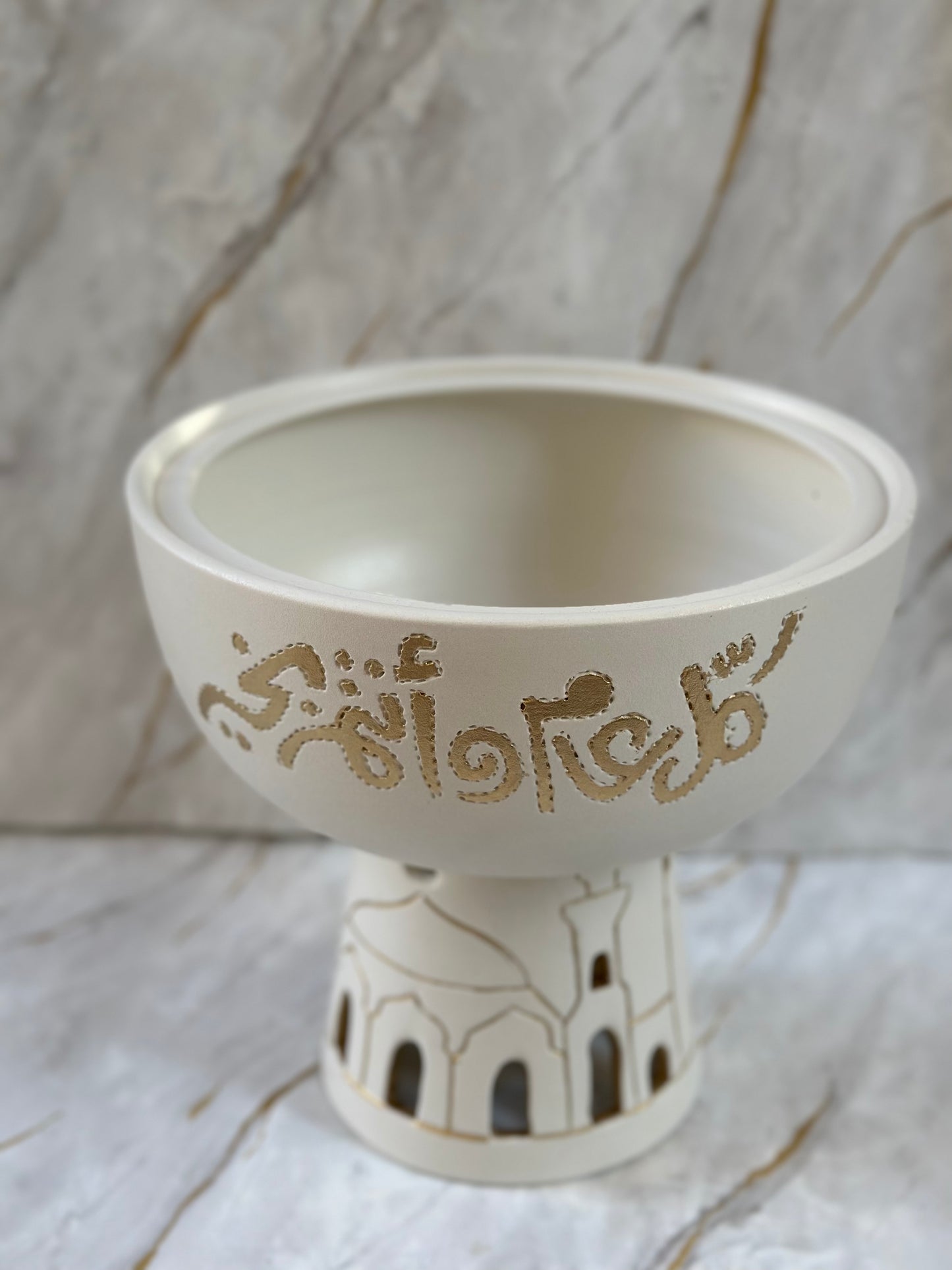 Embrace the essence of Eid with our exquisite Mubarak Ceramic Bowl, meticulously designed for spiritual enhancement. Featuring elegant golden accents and a sturdy handmade ceramic build, it's ideal for enhancing your home decor during this sacred time.