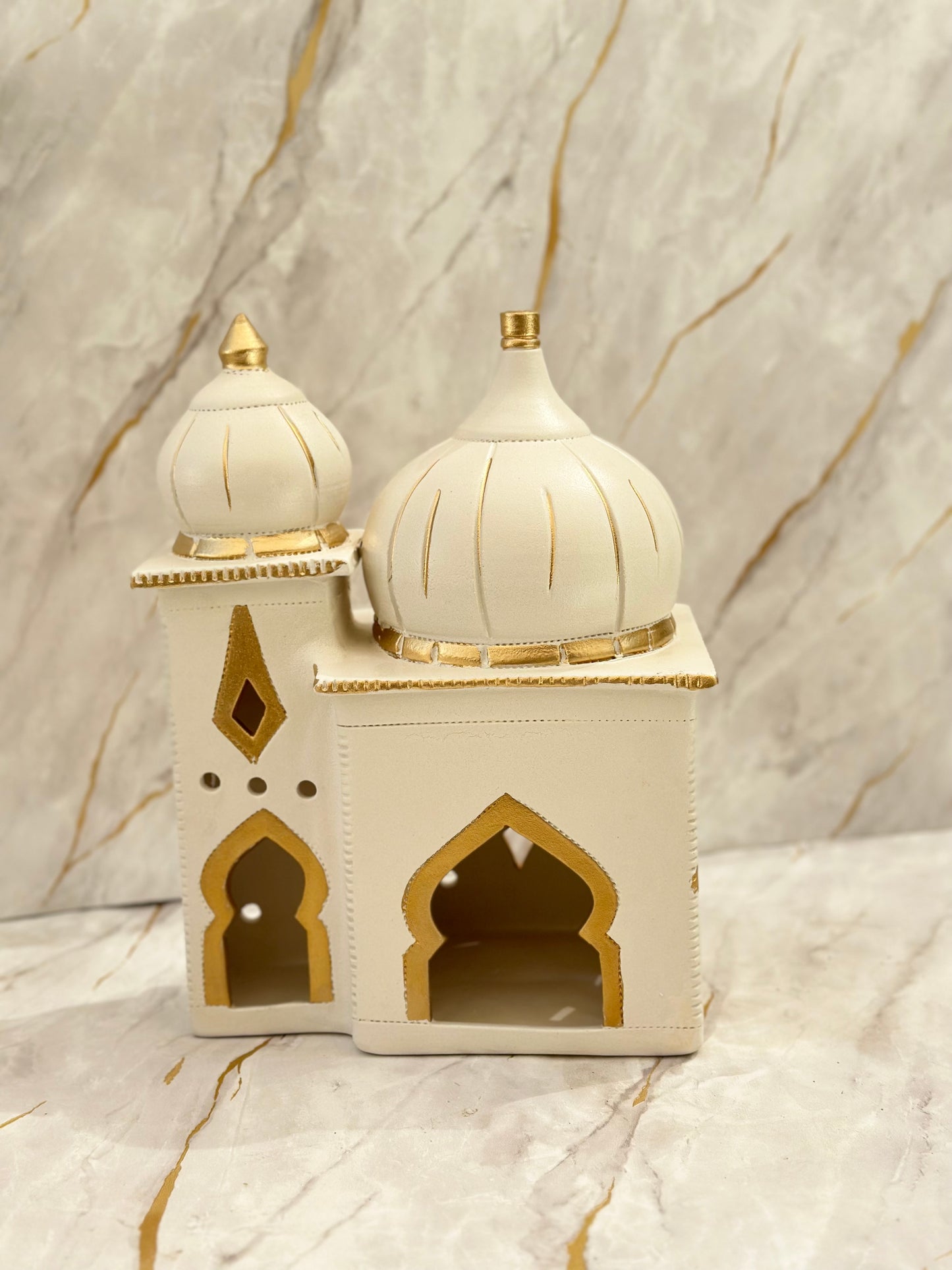 Discover our Handcrafted Ceramic Double Mosque, a stunning blend of tradition and elegance. Crafted by skilled artisans, this masterpiece features delicate Arabic calligraphy and intricate details, symbolizing unity and peace during the sacred month of Ramadan.