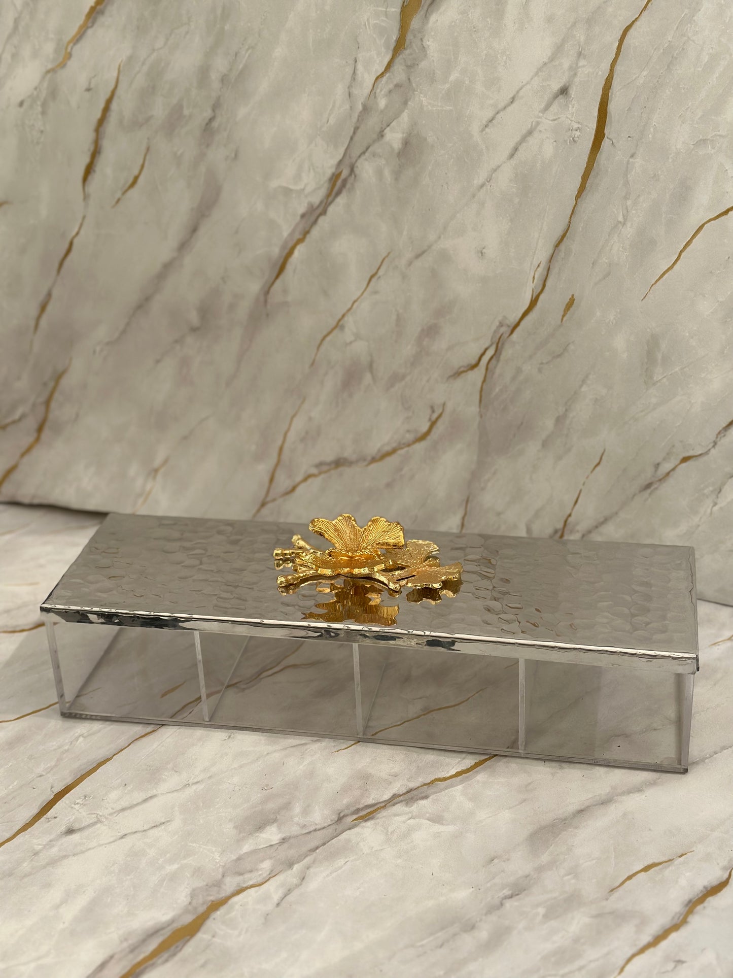 Present your treats in style with our Arabesque Metal Serving Tray. Featuring a mirrored base with segmented compartments for easy organization, it's embellished with an intricate golden floral design. Ideal for adding opulence to any gathering, from chocolates to nuts.