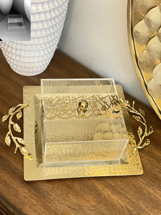  ChatGPT Delight in our Golden tray, a masterpiece of luxurious design. Crafted with a hammered gold base and intricate Arabic calligraphy, it shimmers with light and offers a mesmerizing filigree effect. Perfect for showcasing collectibles or confections, it's a conversation starter at any gathering.