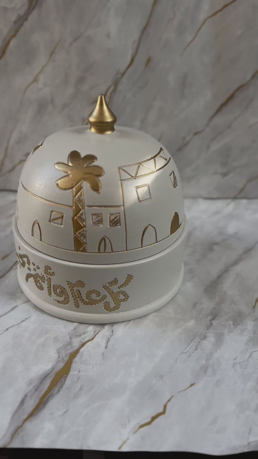 Celebrate Eid in style with our Handmade Ceramic Eid Chocolate Bowl, a masterpiece of craftsmanship. Adorned with timeless gold calligraphy and geometric motifs, it’s perfect for serving sweets or displaying as a symbol of festive joy.