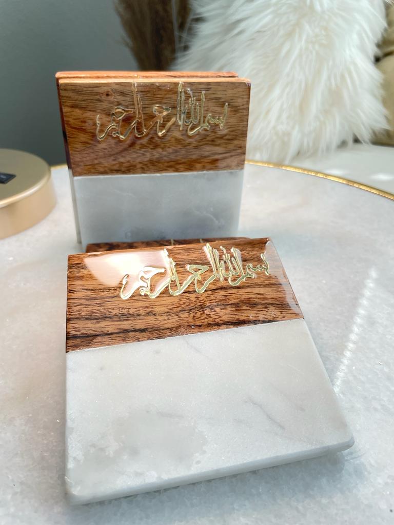 These Marble & Wood Coasters from Threshold blend polished elegance with rustic charm. Their rounded edges and two-toned design add a stylish touch to any table or kitchen counter. Easy to clean and store, they're not just practical but also visually appealing. Ideal for protecting surfaces while enhancing decor, these coasters are a must-have for homes that appreciate both modern aesthetics and natural elements.